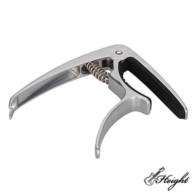 silver color guitar capo
